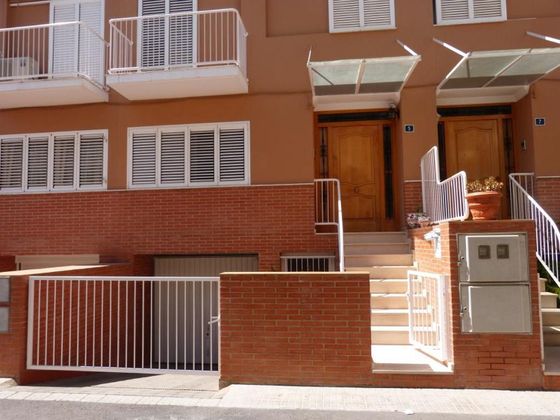 Foto 1 de Casa adosada en venta en Alberic de 3 habitaciones con terraza y aire acondicionado