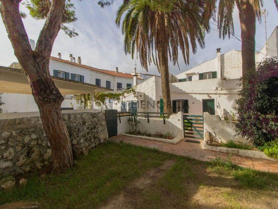 Foto 1 de Casa adossada en venda a Sant Lluís de 4 habitacions amb terrassa i garatge