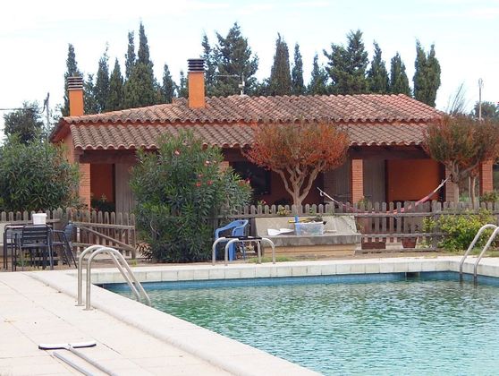 Foto 1 de Casa rural en venta en calle Castanyers de 5 habitaciones con terraza y piscina