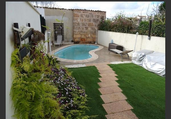 Foto 1 de Venta de casa adosada en Algaida de 4 habitaciones con terraza y piscina