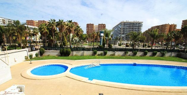 Foto 1 de Pis en venda a avenida Central de 2 habitacions amb terrassa i piscina