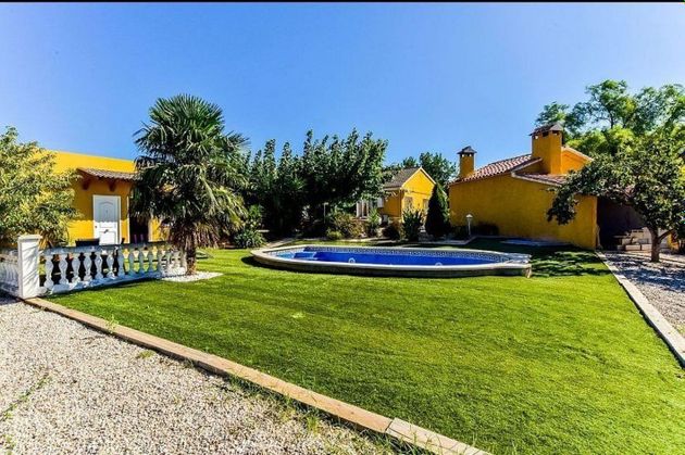 Foto 1 de Casa rural en venta en Alcover de 5 habitaciones con terraza y piscina