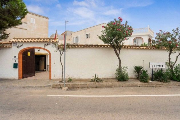 Foto 1 de Venta de casa adosada en Cabo Roig - La Zenia de 5 habitaciones con terraza y garaje