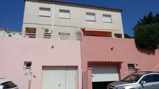 Foto 1 de Venta de casa adosada en Escala, L´ de 4 habitaciones con terraza y garaje