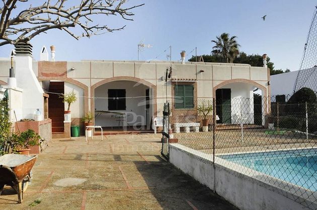 Foto 1 de Venta de chalet en Cala En Blanes de 4 habitaciones con terraza y piscina