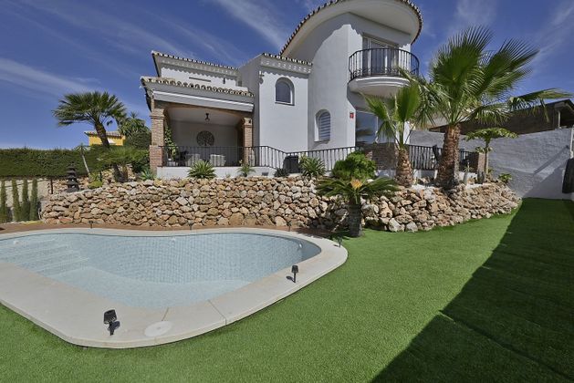 Foto 1 de Venta de chalet en Riviera del Sol de 3 habitaciones con terraza y piscina
