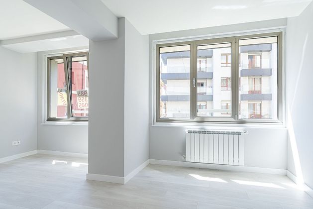Foto 2 de Venta de piso en calle Langreo de 3 habitaciones con calefacción y ascensor
