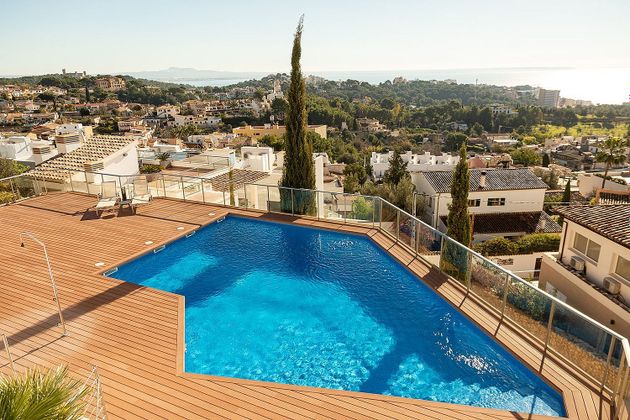 Foto 1 de Casa adossada en venda a Génova de 3 habitacions amb terrassa i piscina