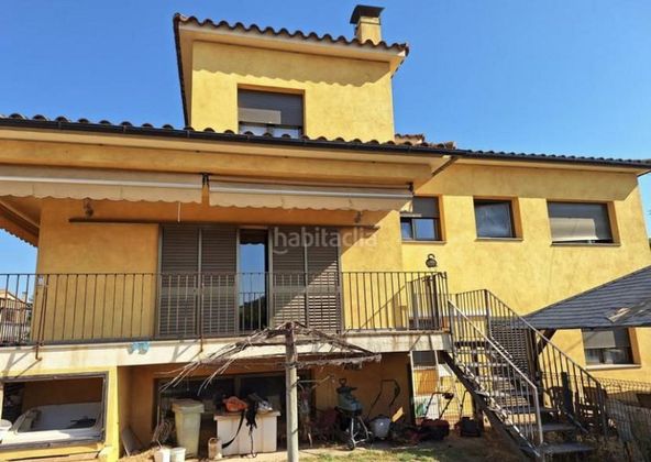 Foto 1 de Casa en venda a Sant Joan de Mollet de 6 habitacions amb terrassa i jardí
