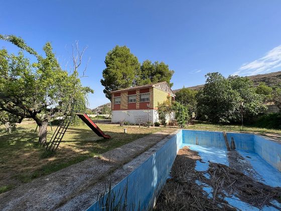 Foto 2 de Xalet en venda a Muel de 3 habitacions amb piscina i jardí