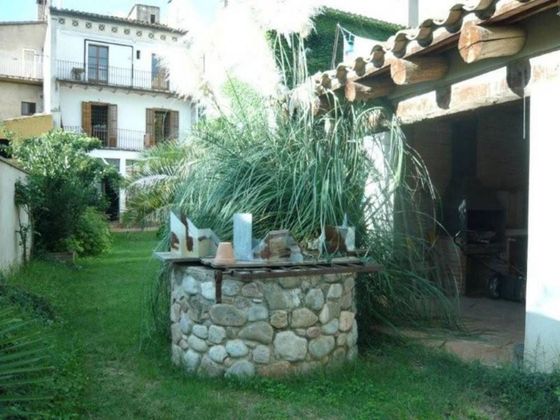 Foto 1 de Casa adosada en venta en Santa Coloma de Farners de 6 habitaciones con terraza y jardín
