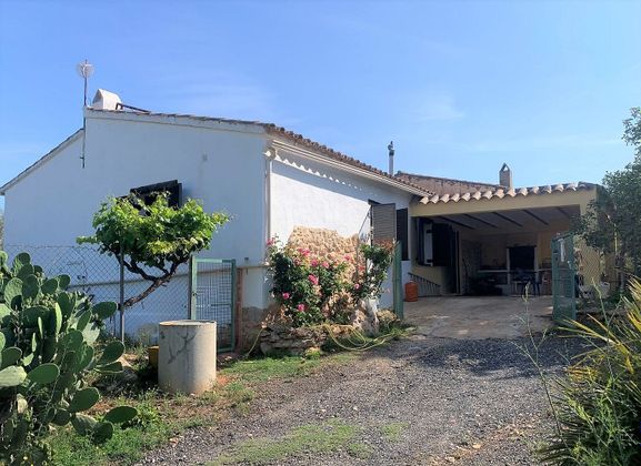 Foto 1 de Casa rural en venta en Perelló, el (Tar) de 5 habitaciones con terraza y jardín