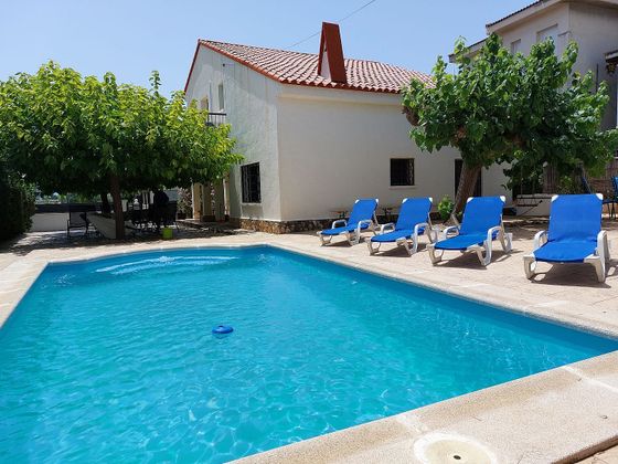 Foto 2 de Chalet en venta en Ampolla, l´ de 5 habitaciones con terraza y piscina