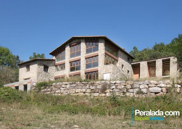Foto 1 de Venta de casa rural en Vall de Bianya, la de 10 habitaciones con terraza y jardín