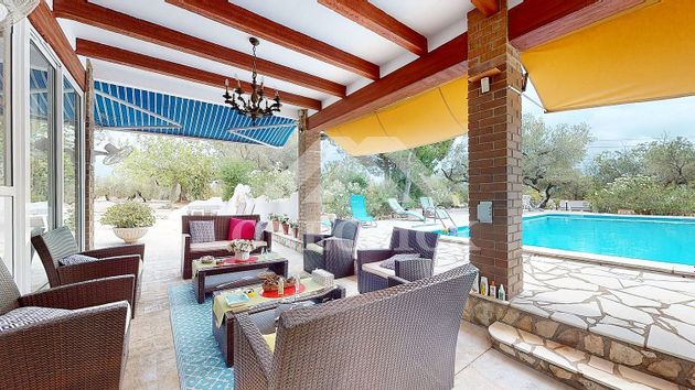 Foto 1 de Xalet en venda a Ampolla, l´ de 4 habitacions amb terrassa i piscina