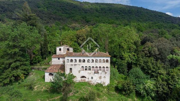 Foto 1 de Casa rural en venda a Mieres (Girona) de 11 habitacions amb jardí