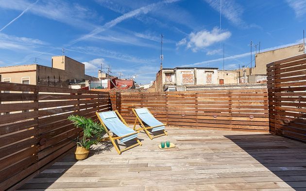Foto 1 de Ático en venta en calle Vallroquetes de 3 habitaciones con terraza y aire acondicionado