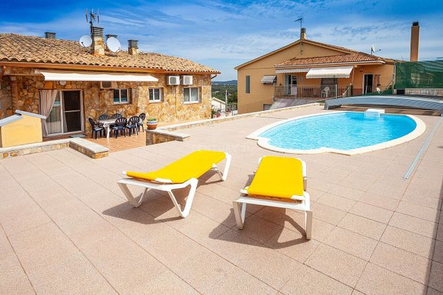 Foto 1 de Xalet en venda a Niàgara Parc - Ágora Parc - Roca Rossa de 3 habitacions amb piscina i aire acondicionat