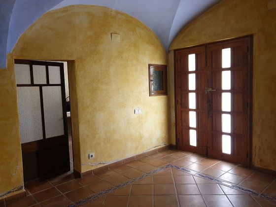Foto 1 de Casa adossada en venda a Tortellà de 4 habitacions amb terrassa