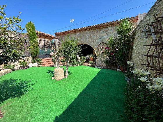 Foto 1 de Casa en venda a Tarrés de 3 habitacions amb terrassa i jardí