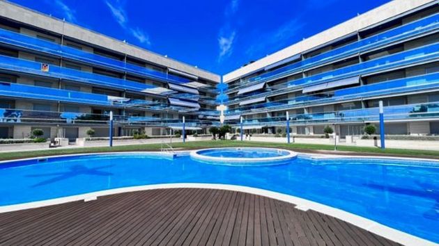 Foto 1 de Venta de piso en Barri Marítim-Platja de la Paella de 3 habitaciones con terraza y piscina