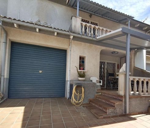 Foto 1 de Casa adossada en venda a Residencial de 4 habitacions amb terrassa i garatge