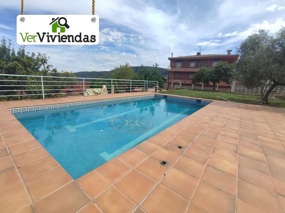 Foto 1 de Chalet en venta en Vallirana de 8 habitaciones con terraza y piscina
