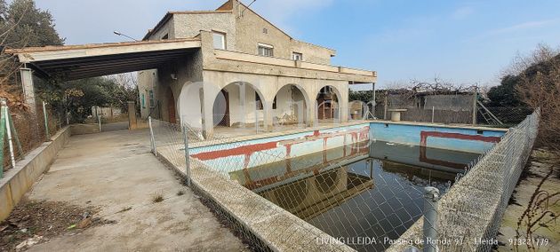 Foto 1 de Xalet en venda a Alguaire de 6 habitacions amb terrassa i piscina