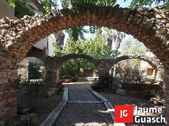 Foto 2 de Casa adossada en venda a La Mora de 17 habitacions amb terrassa i jardí