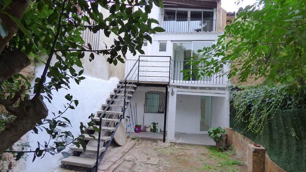 Foto 1 de Casa adosada en venta en calle D'en Francesc Viñas de 5 habitaciones con terraza y jardín