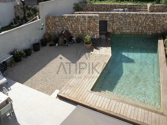 Foto 1 de Casa adossada en venda a Maó de 4 habitacions amb terrassa i piscina