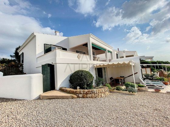 Foto 2 de Casa adossada en venda a Sant Lluís de 3 habitacions amb terrassa i garatge