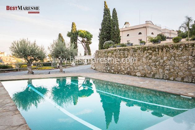 Foto 1 de Xalet en venda a Tiana de 9 habitacions amb terrassa i piscina