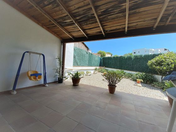 Foto 2 de Venta de casa adosada en La Fosca-Cala Margarida de 3 habitaciones con terraza y jardín