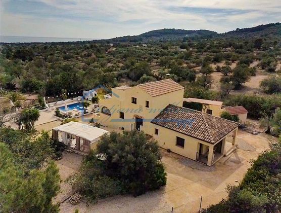 Foto 1 de Casa rural en venda a calle Disseminats de 8 habitacions amb terrassa i piscina