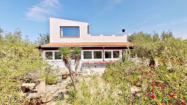 Foto 1 de Casa rural en venda a Camarles de 3 habitacions amb terrassa i jardí