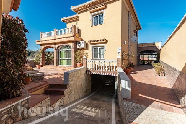 Foto 1 de Venta de casa en El Candado - El Palo de 7 habitaciones con terraza y piscina