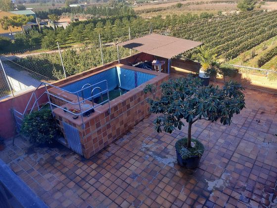 Foto 1 de Casa en venta en Albatàrrec de 1 habitación con piscina y aire acondicionado