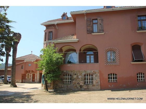Foto 1 de Chalet en venta en L'Eixample de 9 habitaciones con terraza y garaje
