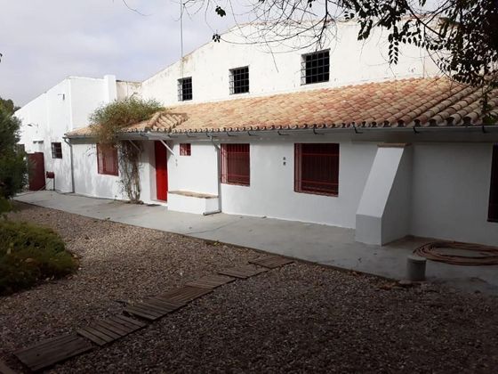 Foto 1 de Casa rural en venda a Carlota (La) de 5 habitacions amb piscina i jardí