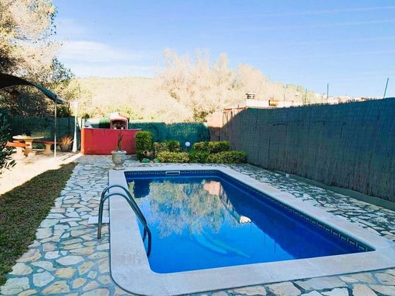 Foto 1 de Venta de casa en Mas Trader-Corral D’En Tort-Corral D’En Cona de 4 habitaciones con terraza y piscina