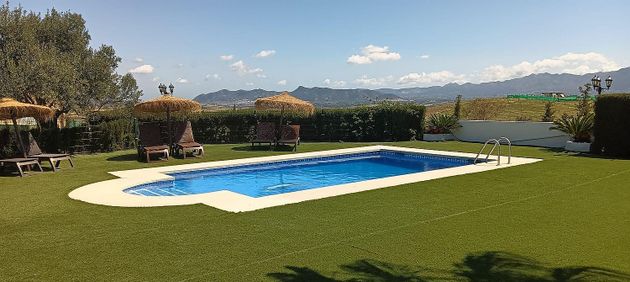 Foto 1 de Venta de chalet en Cártama de 7 habitaciones con terraza y piscina