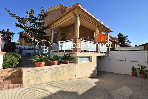 Foto 1 de Venta de casa adosada en calle Tarragones de 4 habitaciones con terraza y garaje