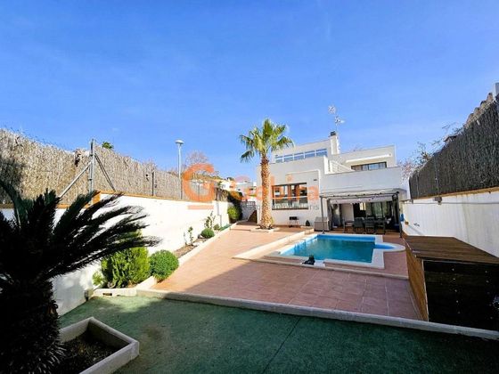 Foto 1 de Casa adossada en venda a Mas Mel - Bellamar de 4 habitacions amb terrassa i piscina
