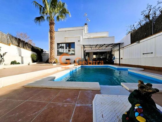 Foto 2 de Casa adossada en venda a Mas Mel - Bellamar de 4 habitacions amb terrassa i piscina