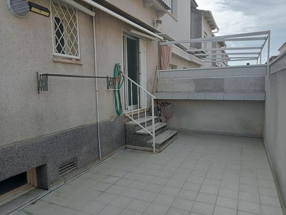 Foto 2 de Casa adossada en venda a Residencial de 5 habitacions amb terrassa i garatge
