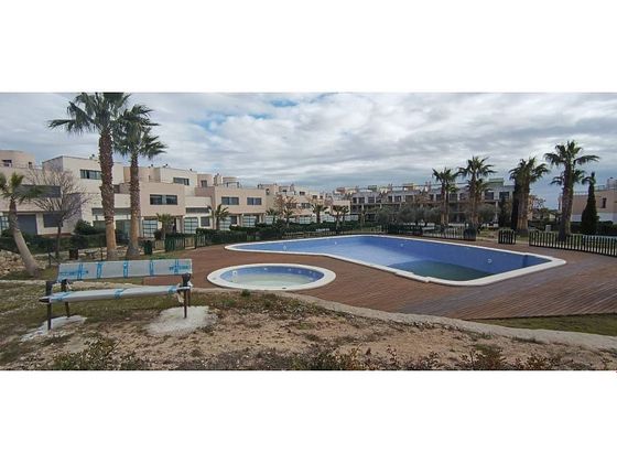 Foto 1 de Piso en venta en calle Valencia de 2 habitaciones con terraza y piscina