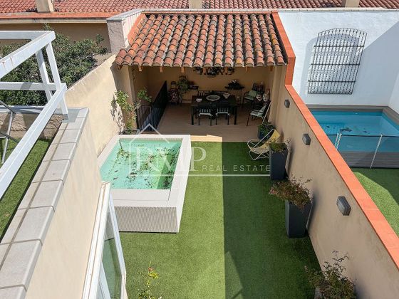 Foto 1 de Casa adossada en venda a calle De L'esplanada de 5 habitacions amb terrassa i jardí