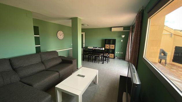 Foto 1 de Venta de piso en Ferreries de 3 habitaciones con terraza y aire acondicionado