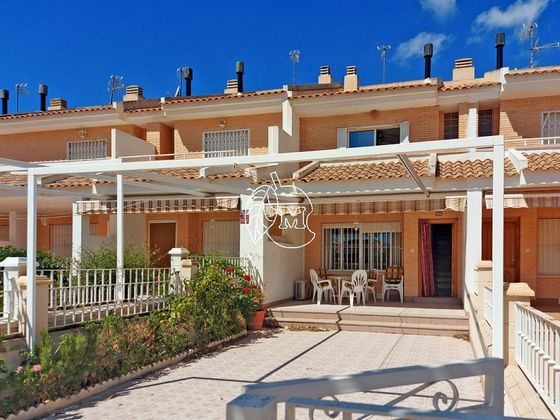 Foto 1 de Casa adosada en venta en Los Narejos de 4 habitaciones con terraza y piscina